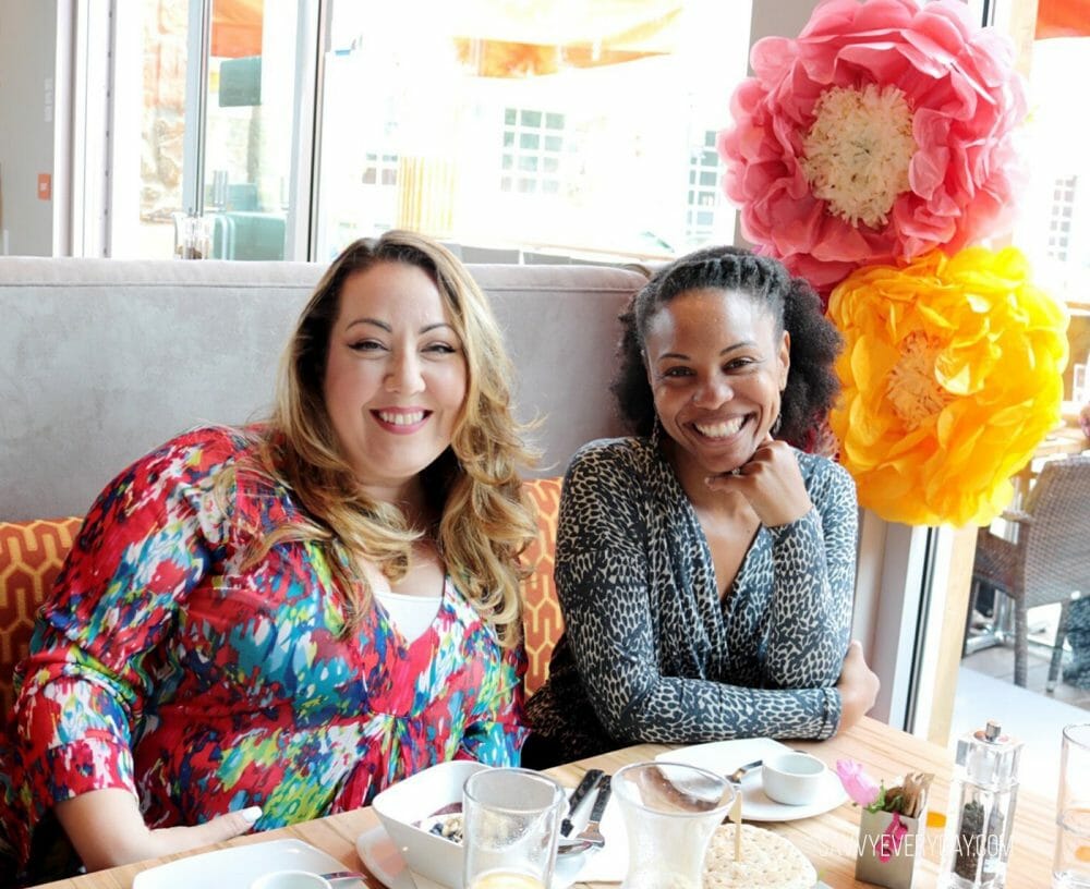 brandi and dawn smiling at brunch