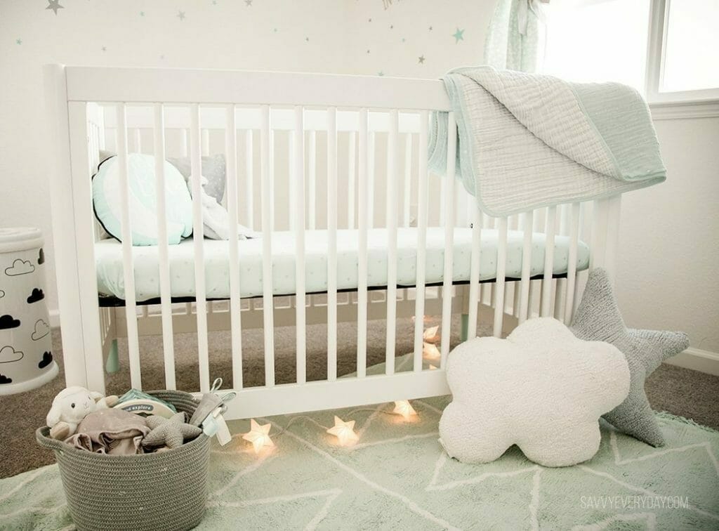 mint nursery room crib