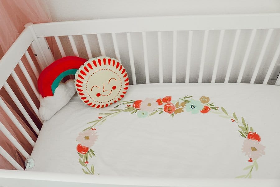 close up of floral bohemian crib 