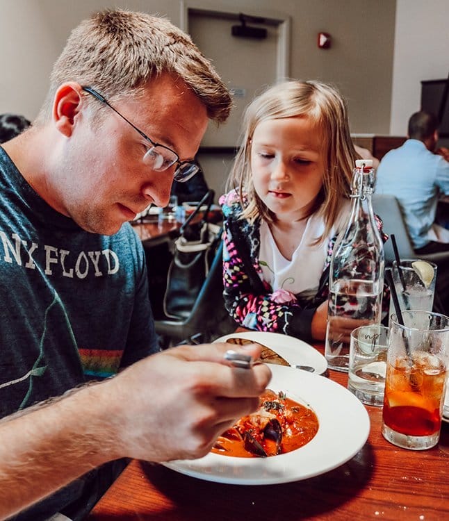 father and daughter eating lunch at Trabocco in Alameda