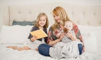 Family looking at Fire Kids Tablet