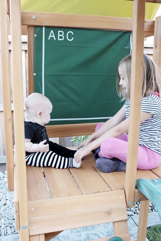 kids palying in play structure