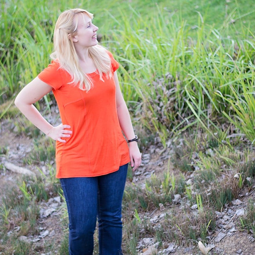 orange shirt looking up IG