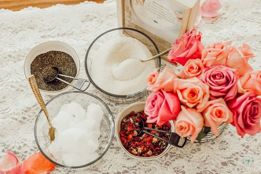 overhead shot of mixed green tea and rose sugar scrub ingredients