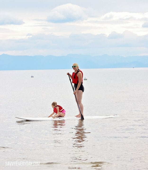 SUP with S playing in water