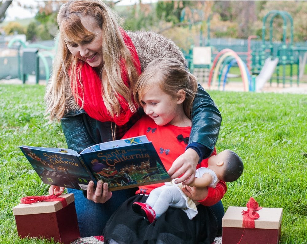 reading a Santa book to the kiddo